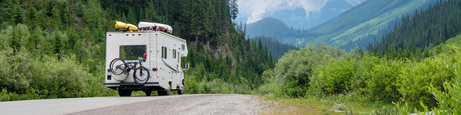 RV driving at sunset — shop RV parts, hitches, solar, and generators