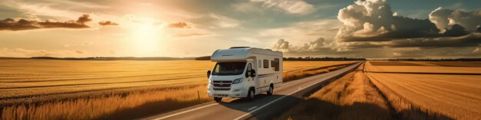 RV driving at sunset — shop RV parts, hitches, solar, and generators