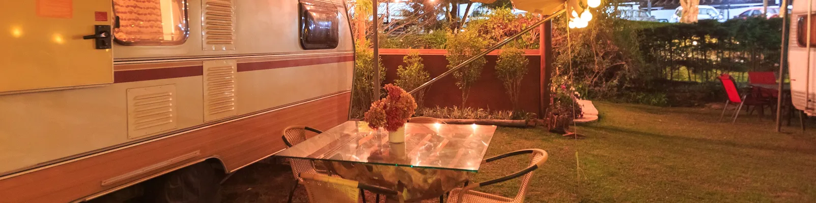 RV driving at sunset — shop RV parts, hitches, solar, and generators